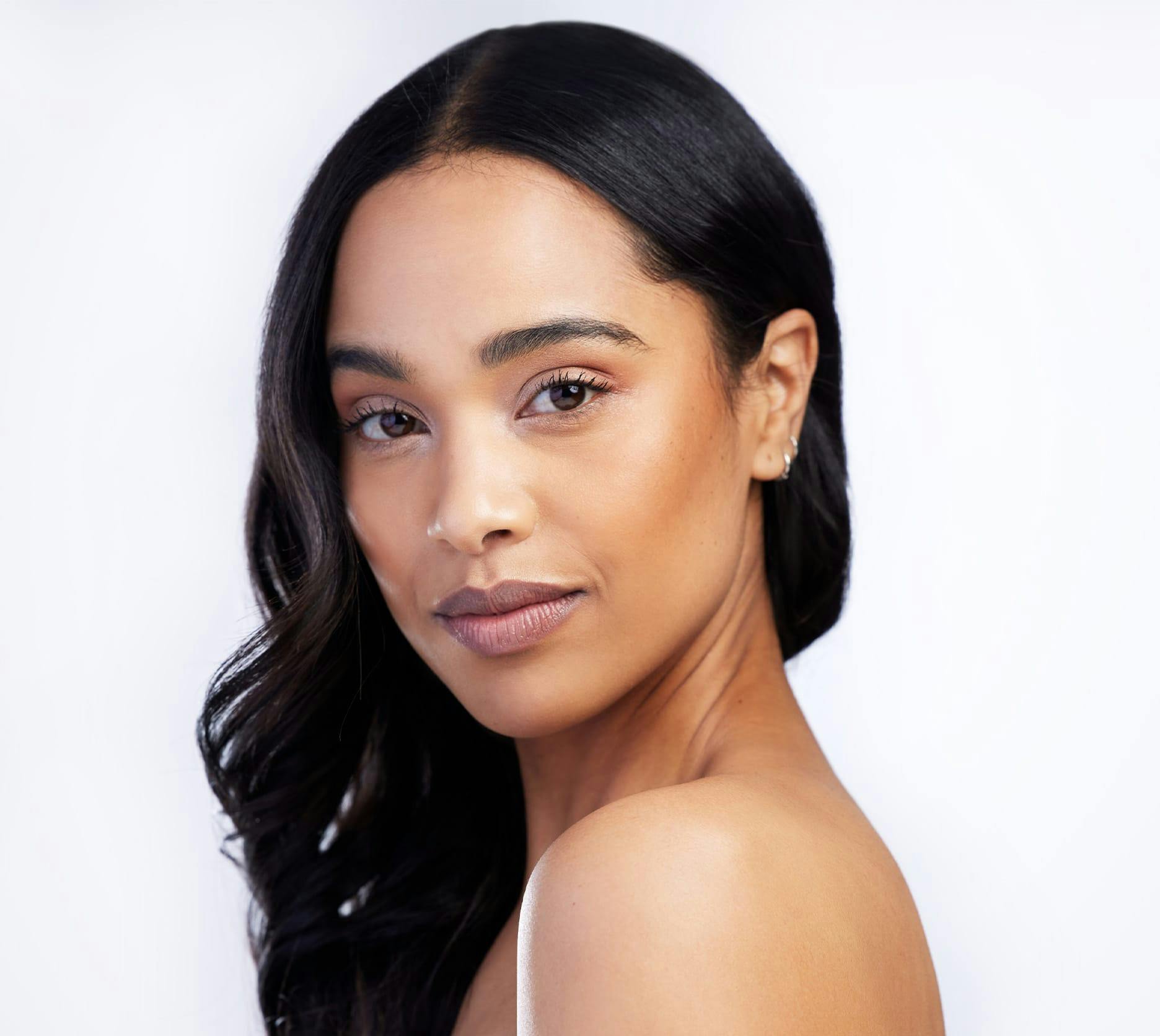 woman looking over her shoulder