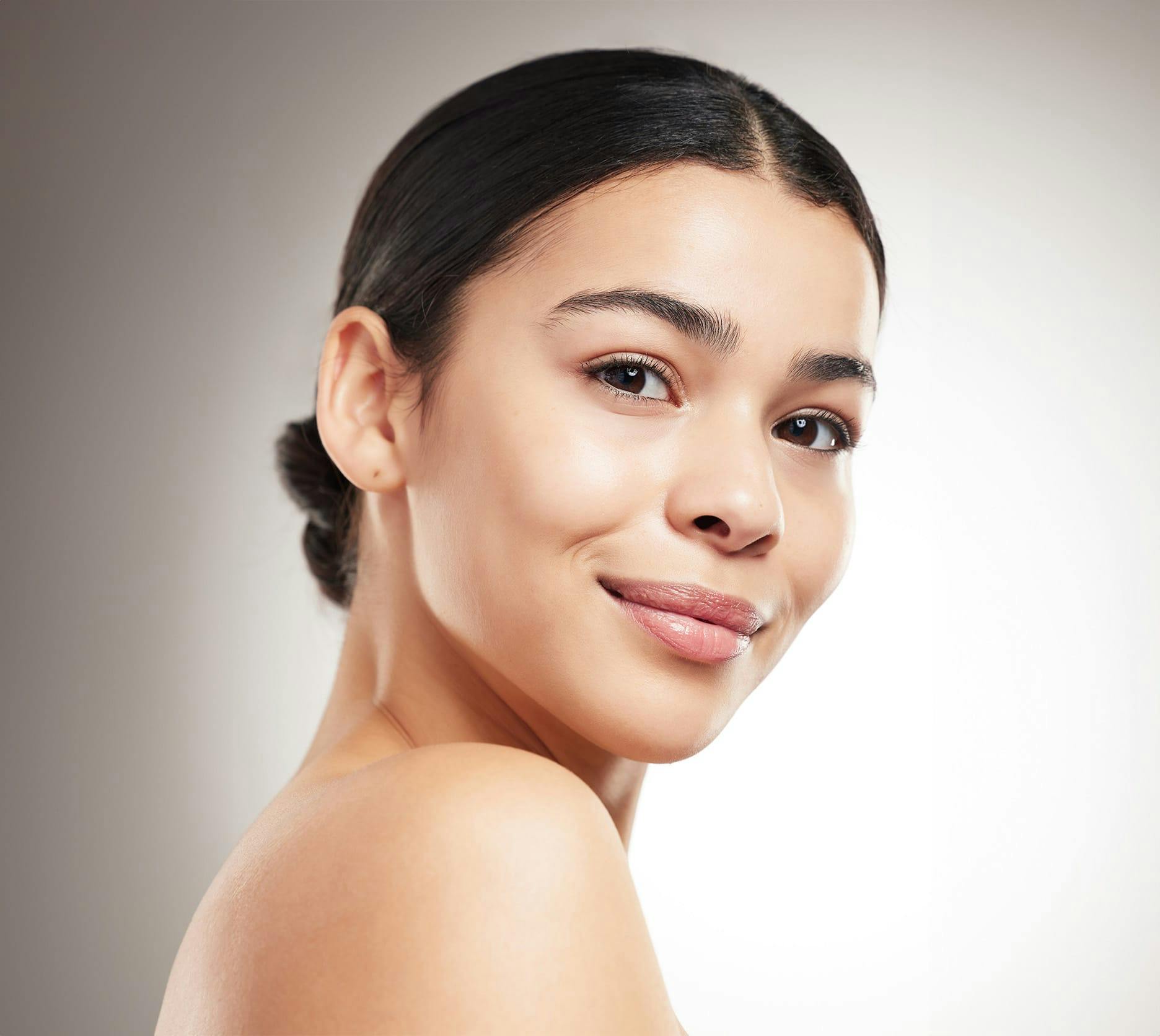 woman looking over her shoulder