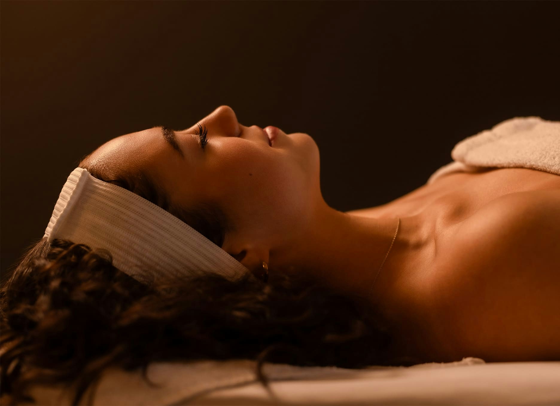 woman laying on a massage table