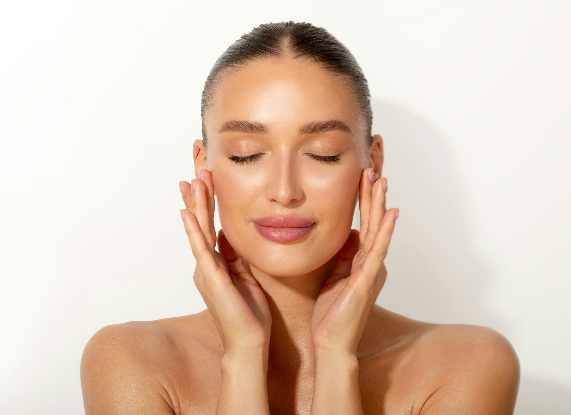 woman touching her face