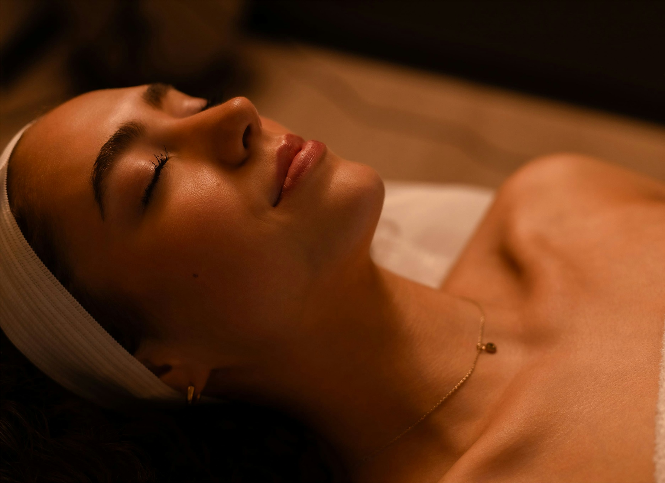 woman laying on a massage table