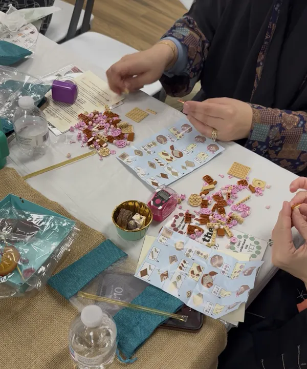 Muslim sisters threading