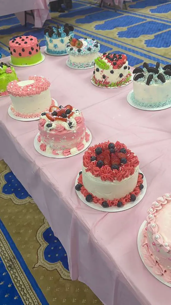 a table with cakes in a mosque