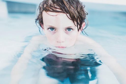 Boy in swimming pool