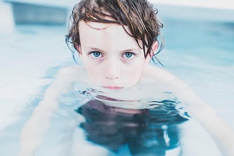 Boy in swimming pool