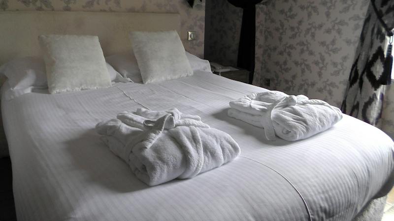 airbnb bed with towels