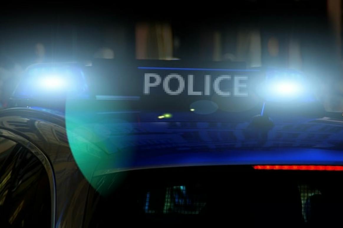 A police car with its lights on