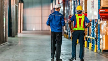 Warehouse employees working on logistics.