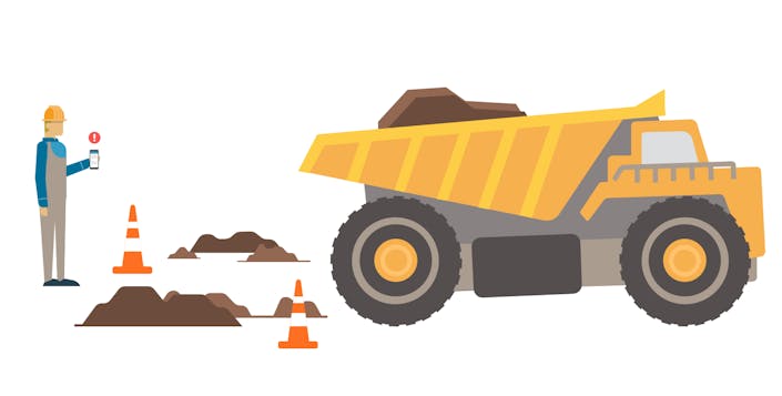 Dump truck with dirt and worker