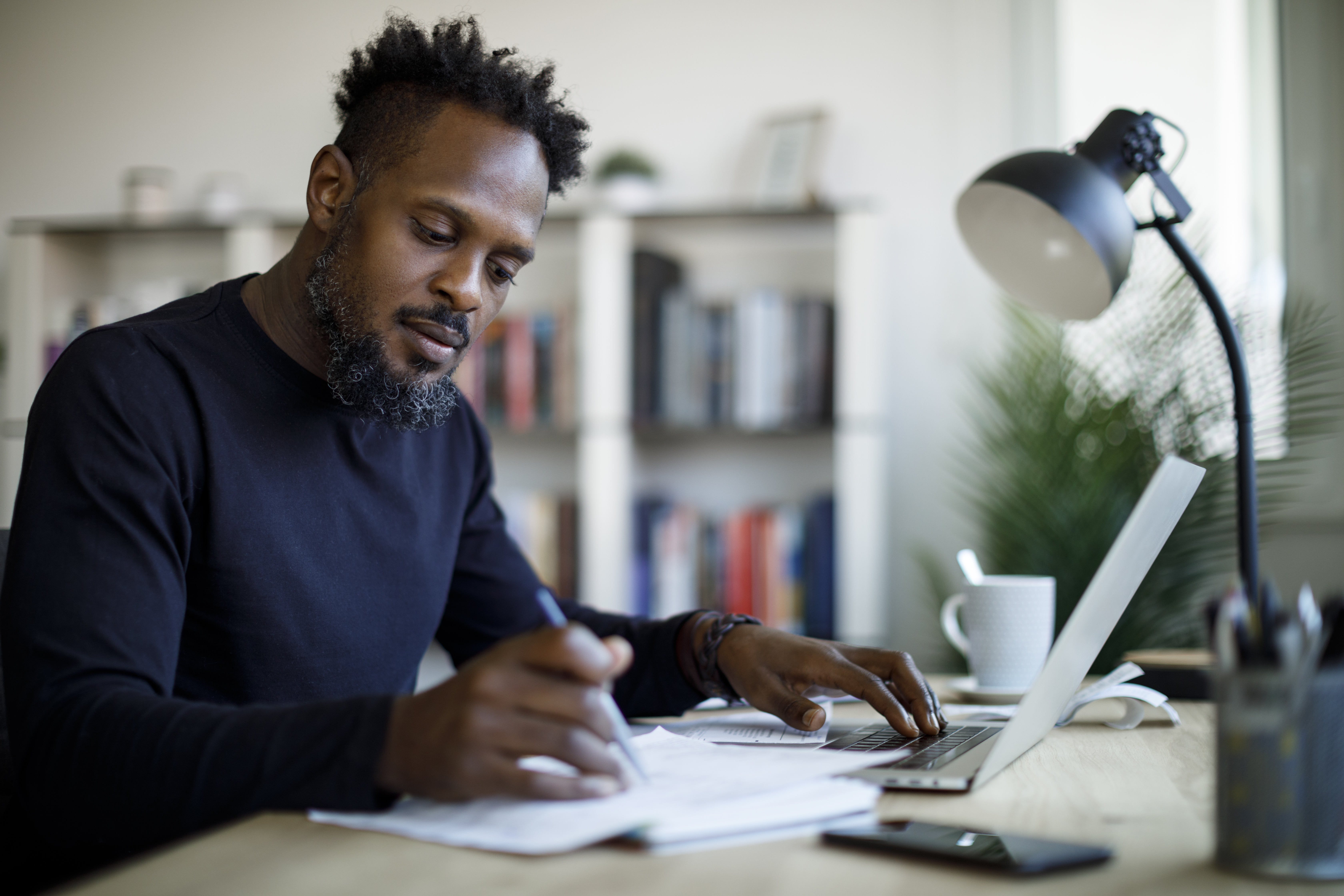Man at desk with laptop