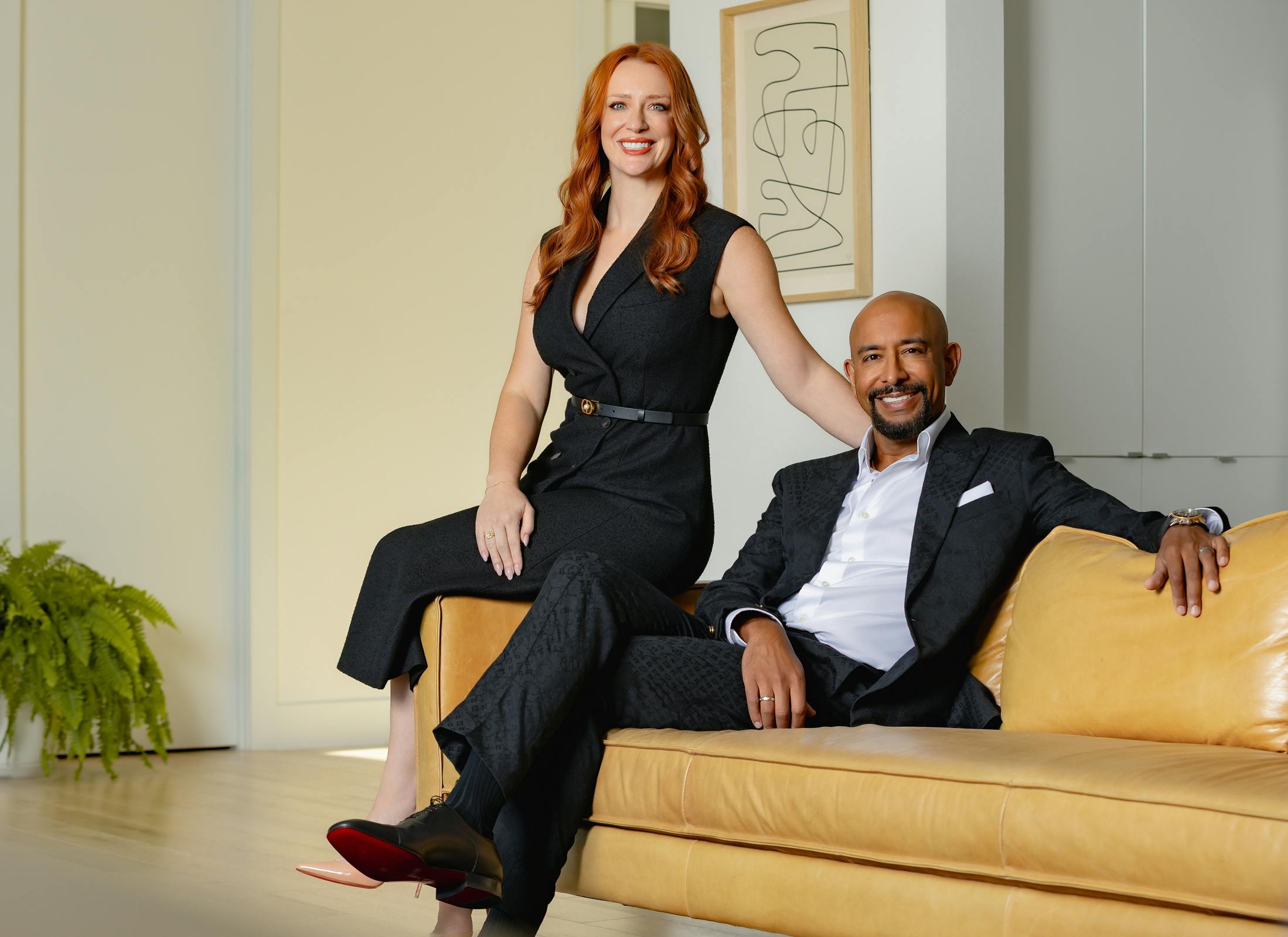 Dr. Kashyap and Kristina Kashyap sitting on couch