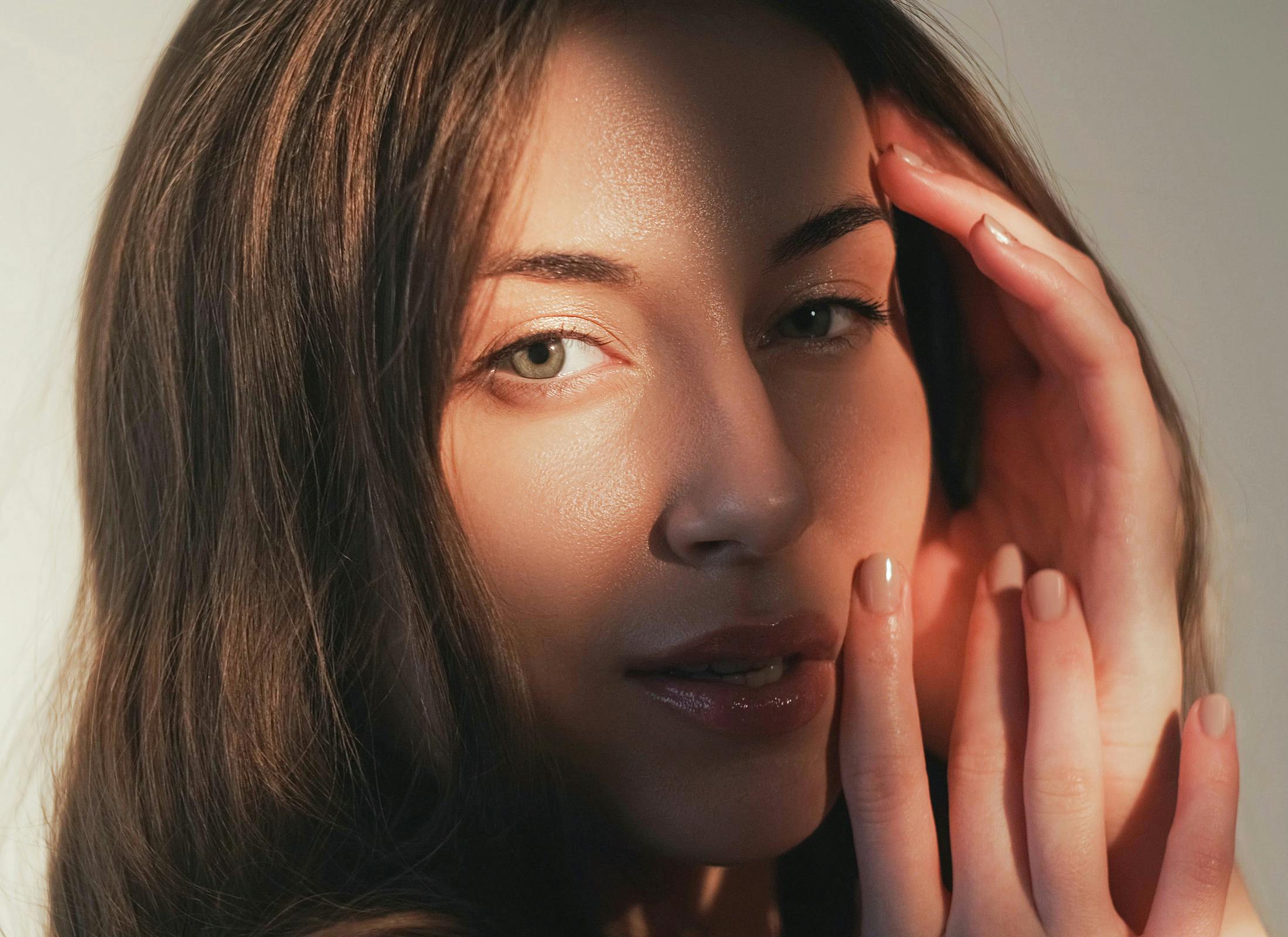 woman with hands on face