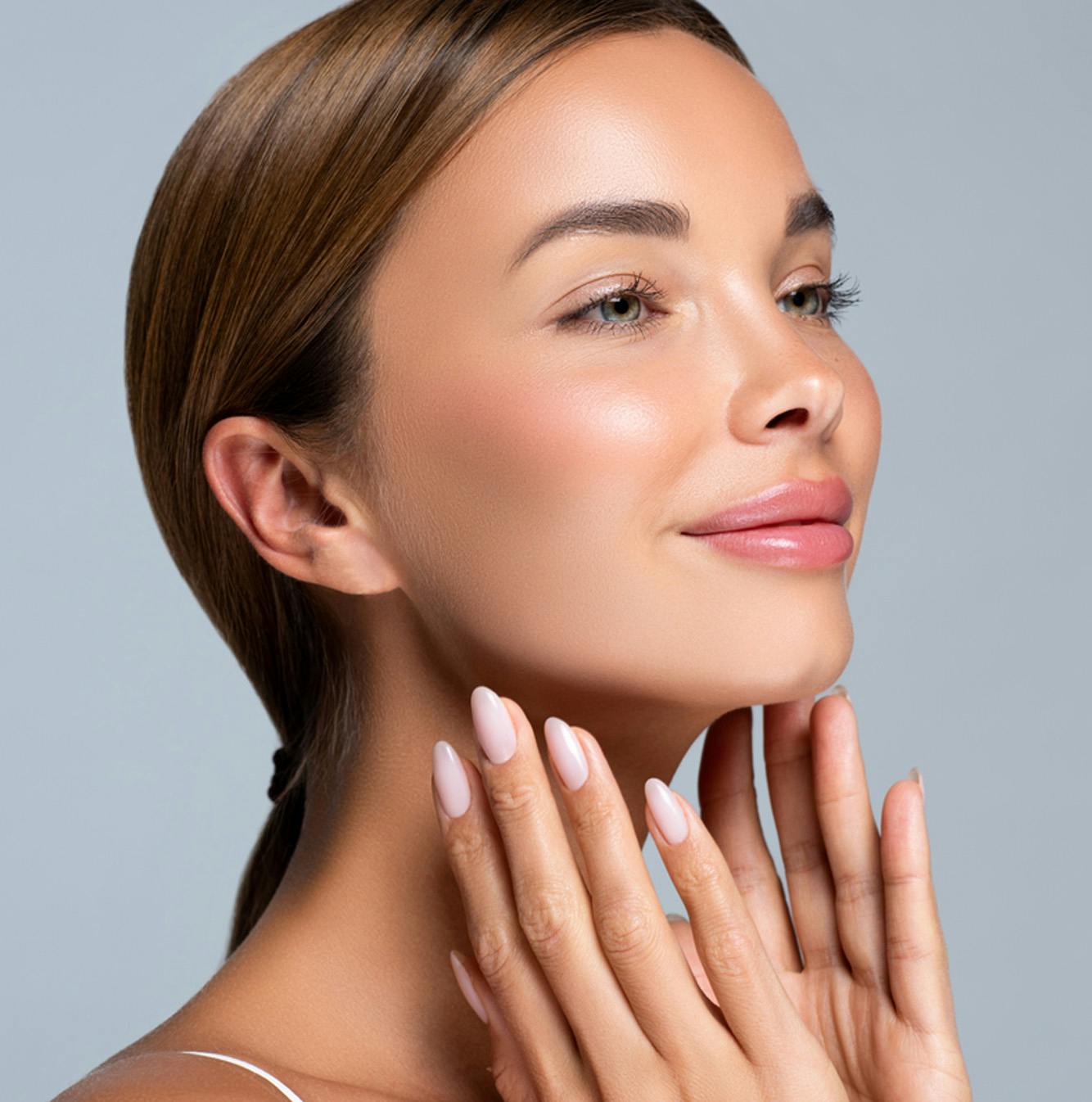 woman with hands framing face