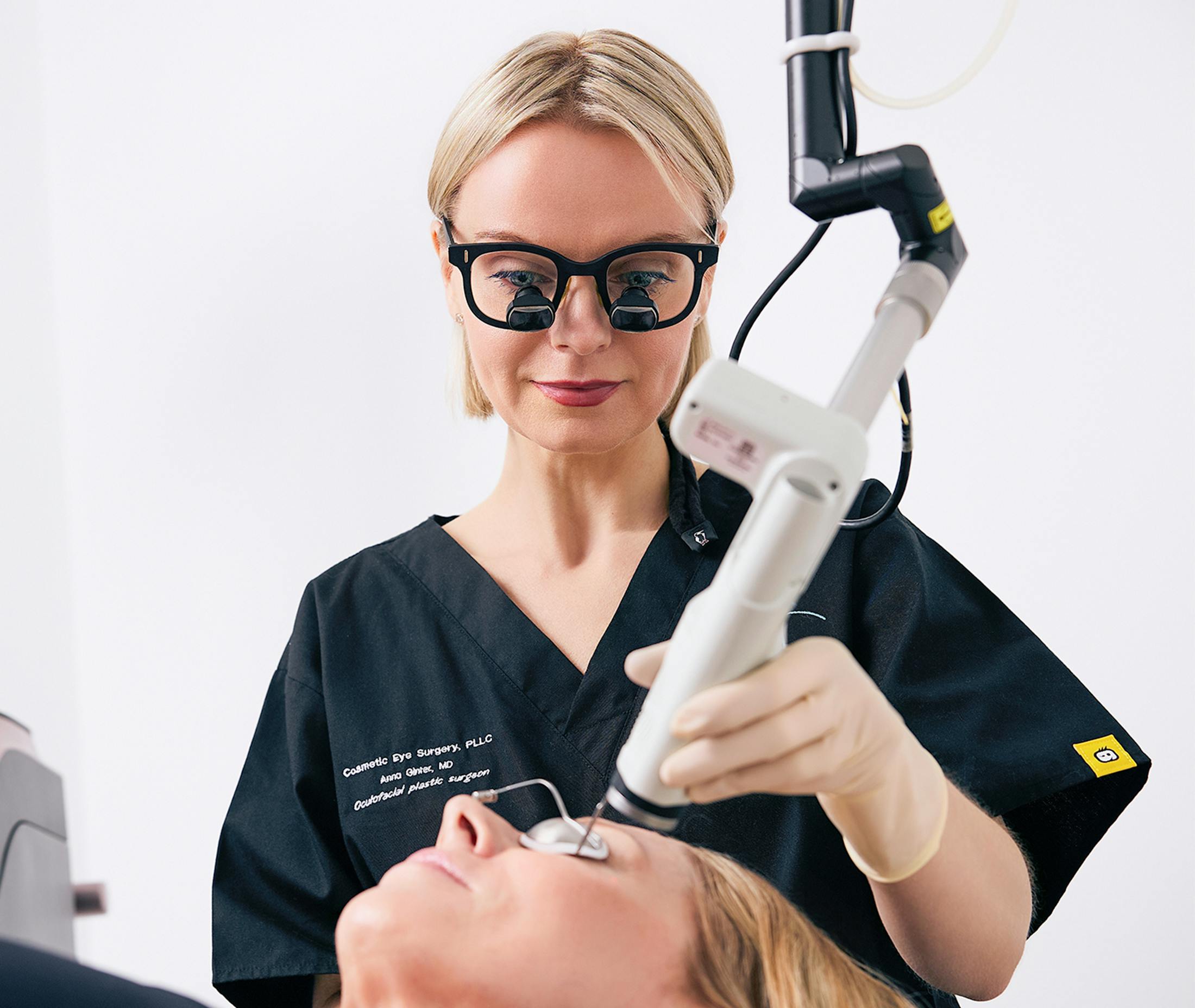 Dr. Anna Ginter administering laser treatment