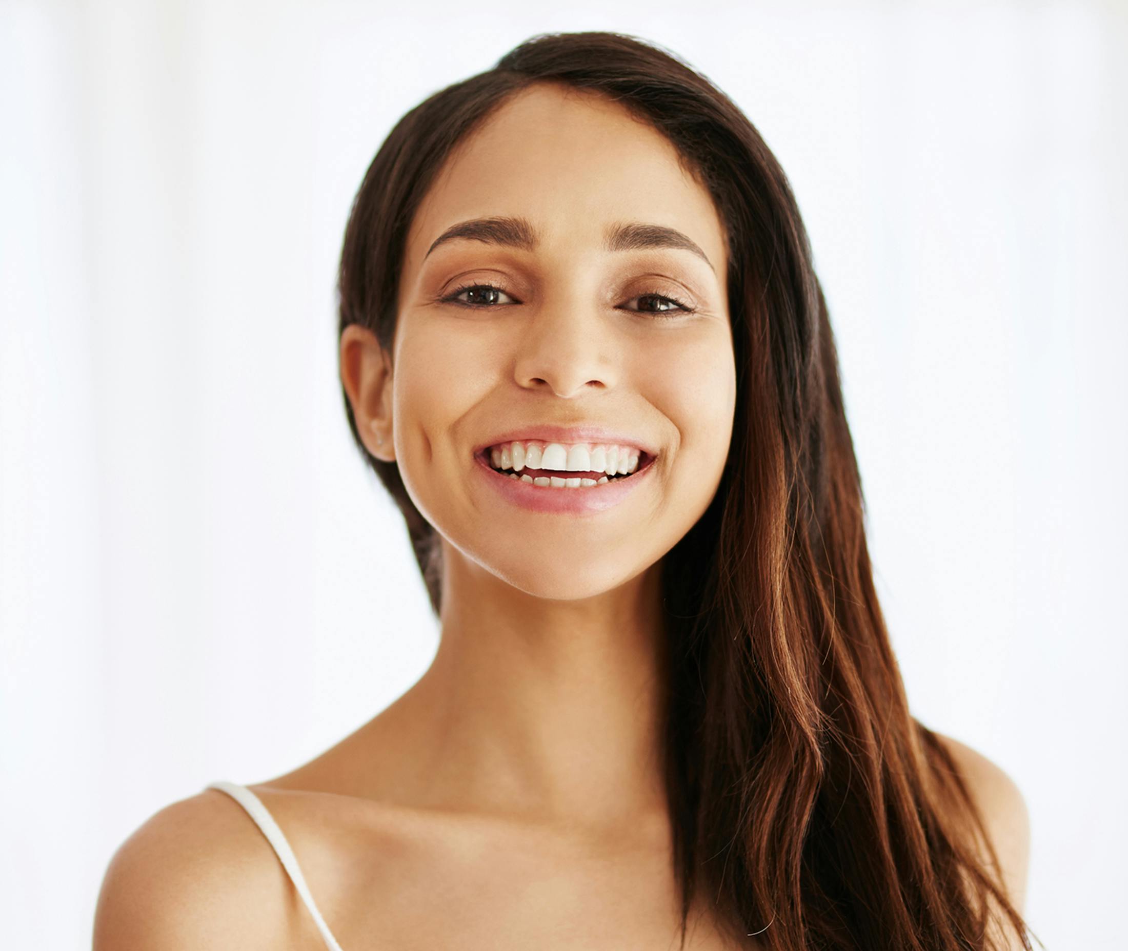 smiling woman with long dark hair