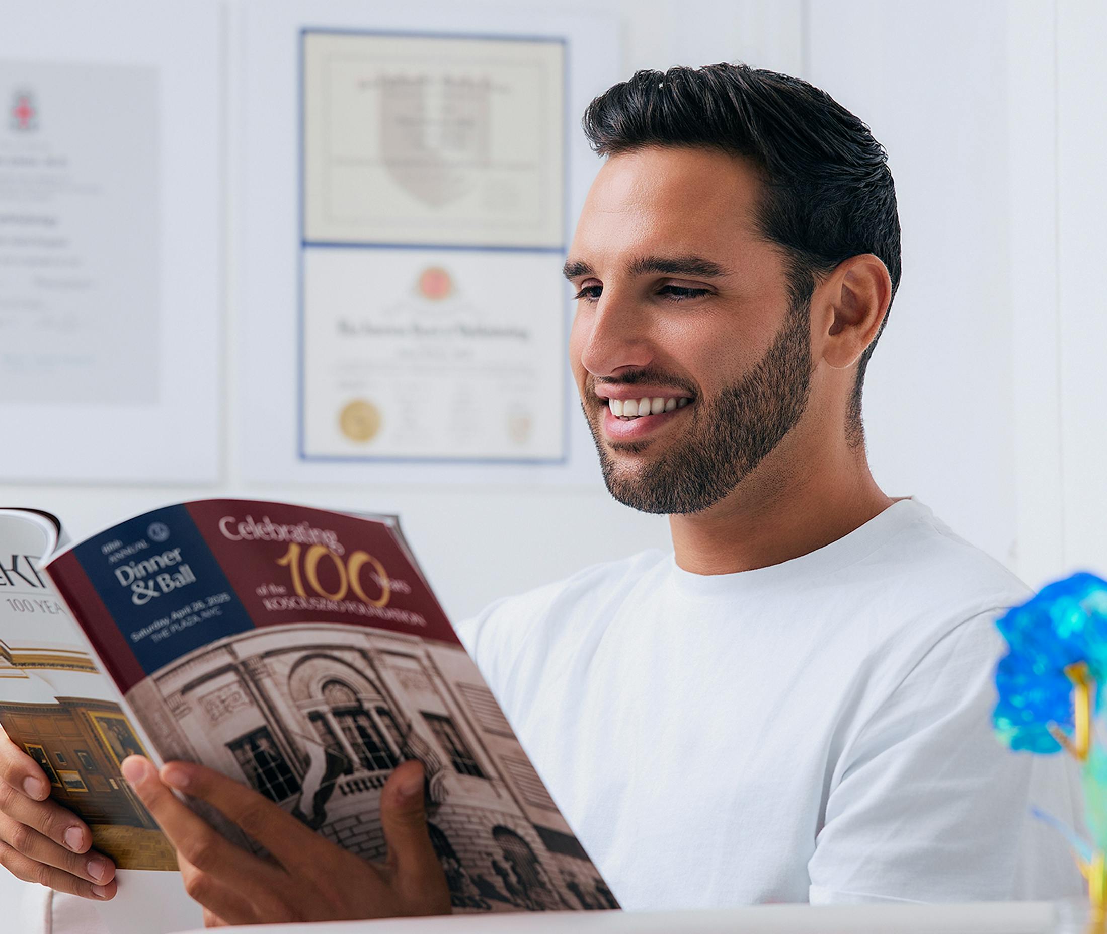 man reading magazine