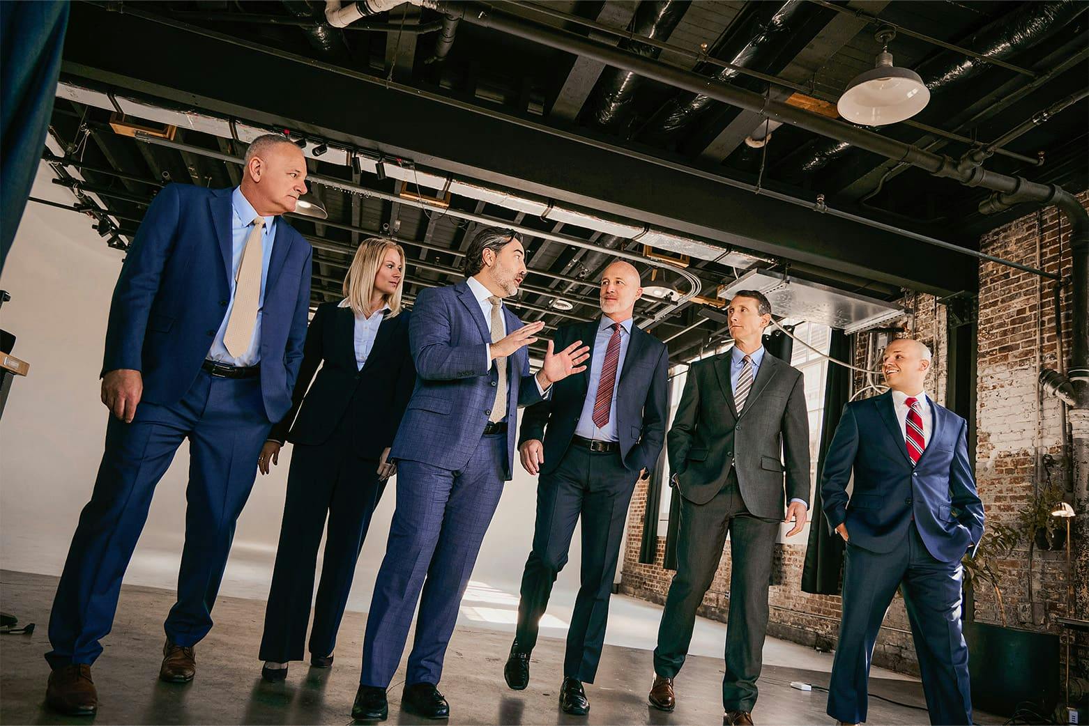 Six attorneys walking and talking