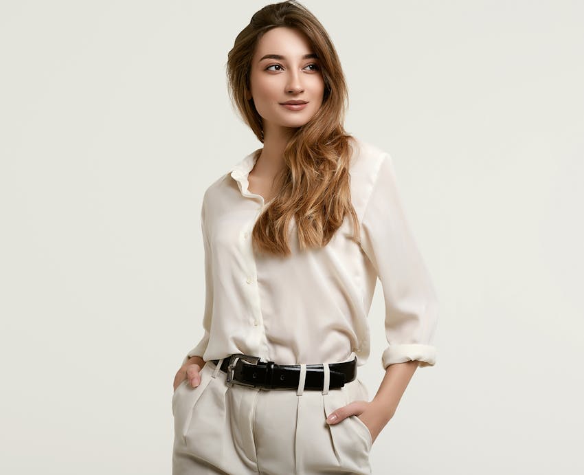 woman with hands in pockets