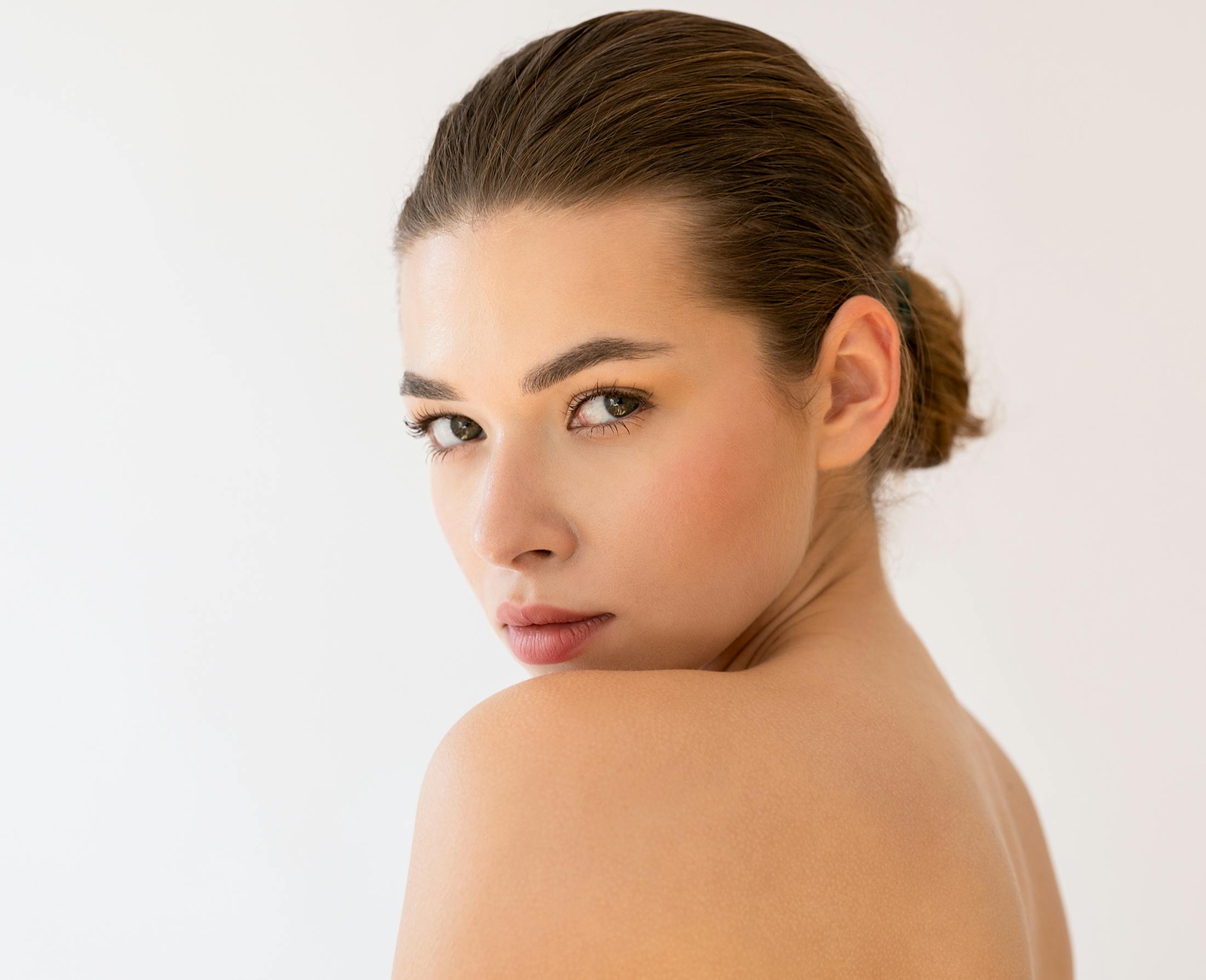 woman looking over the shoulder