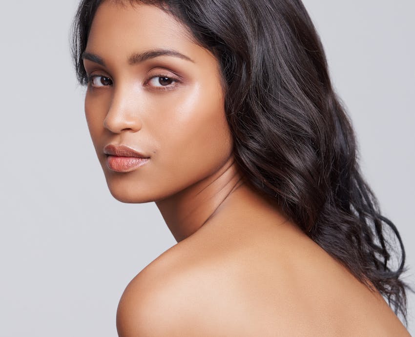 woman looking over shoulder