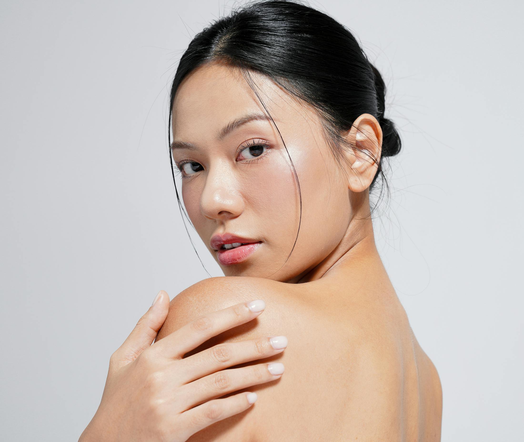 woman looking over shoulder