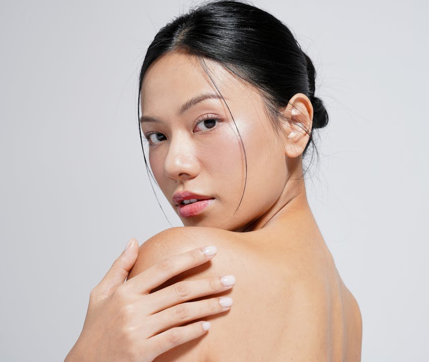 woman looking over shoulder