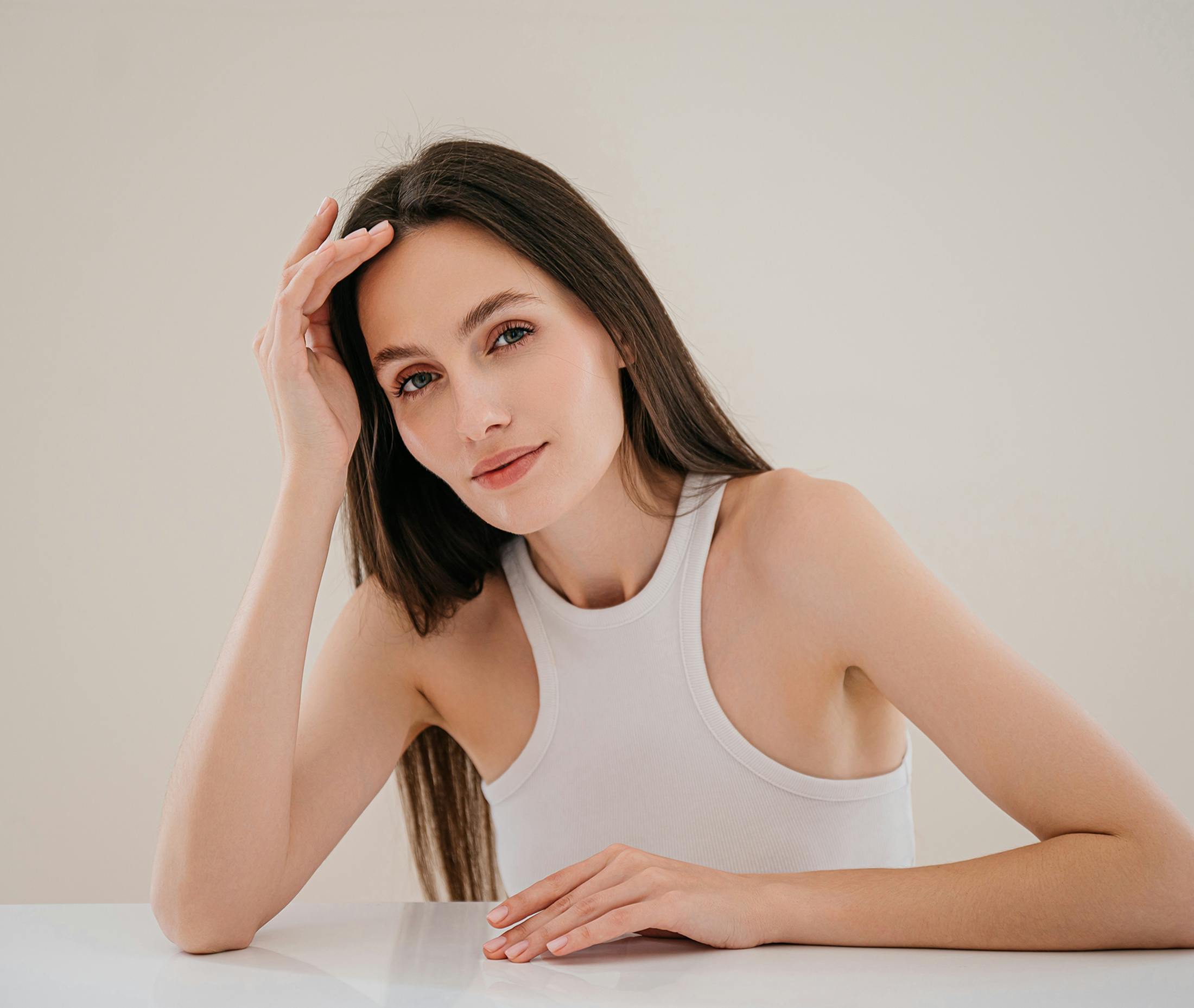 woman with head in hands