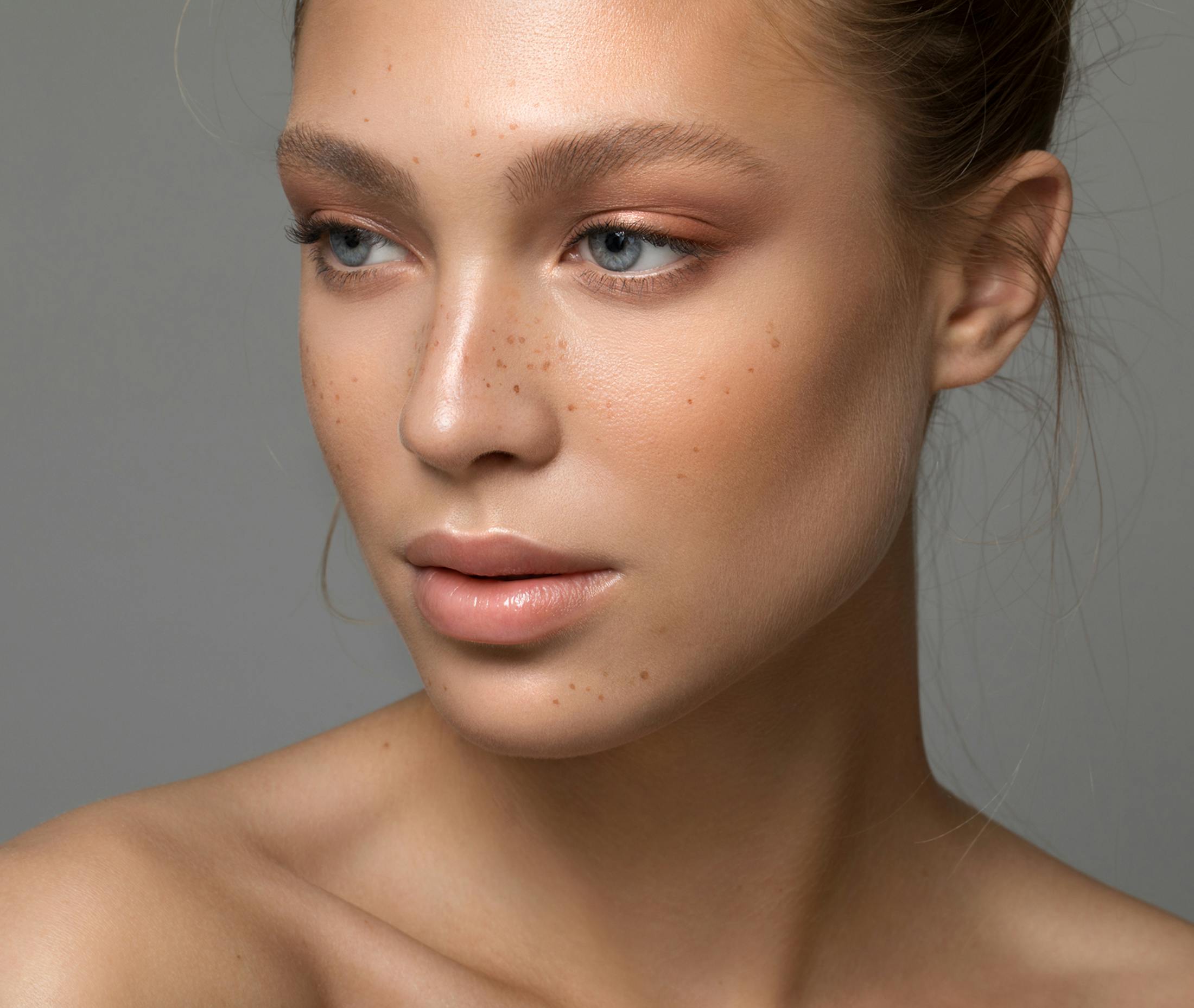 headshot of a woman looking to the side