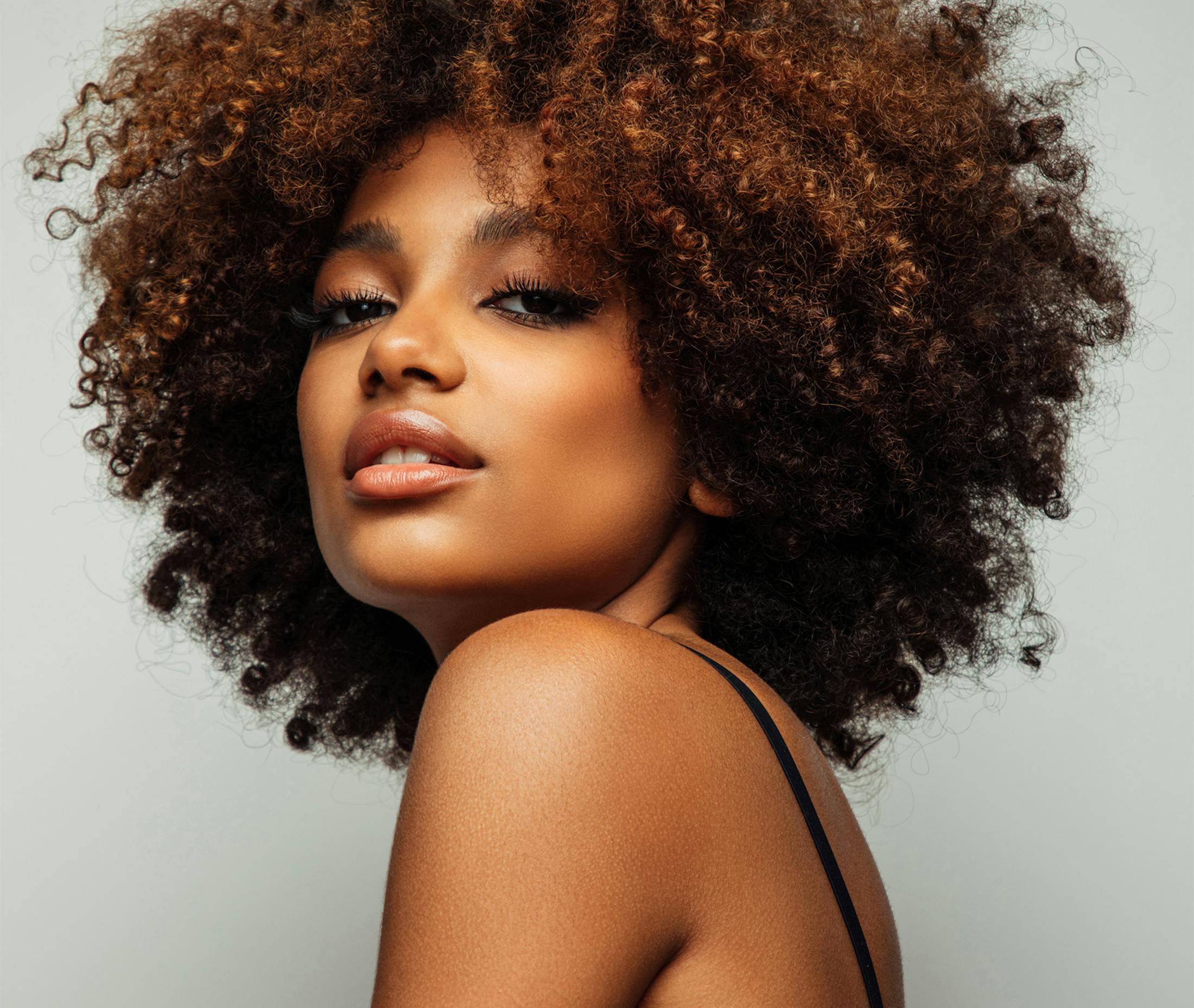 woman looking over shoulder