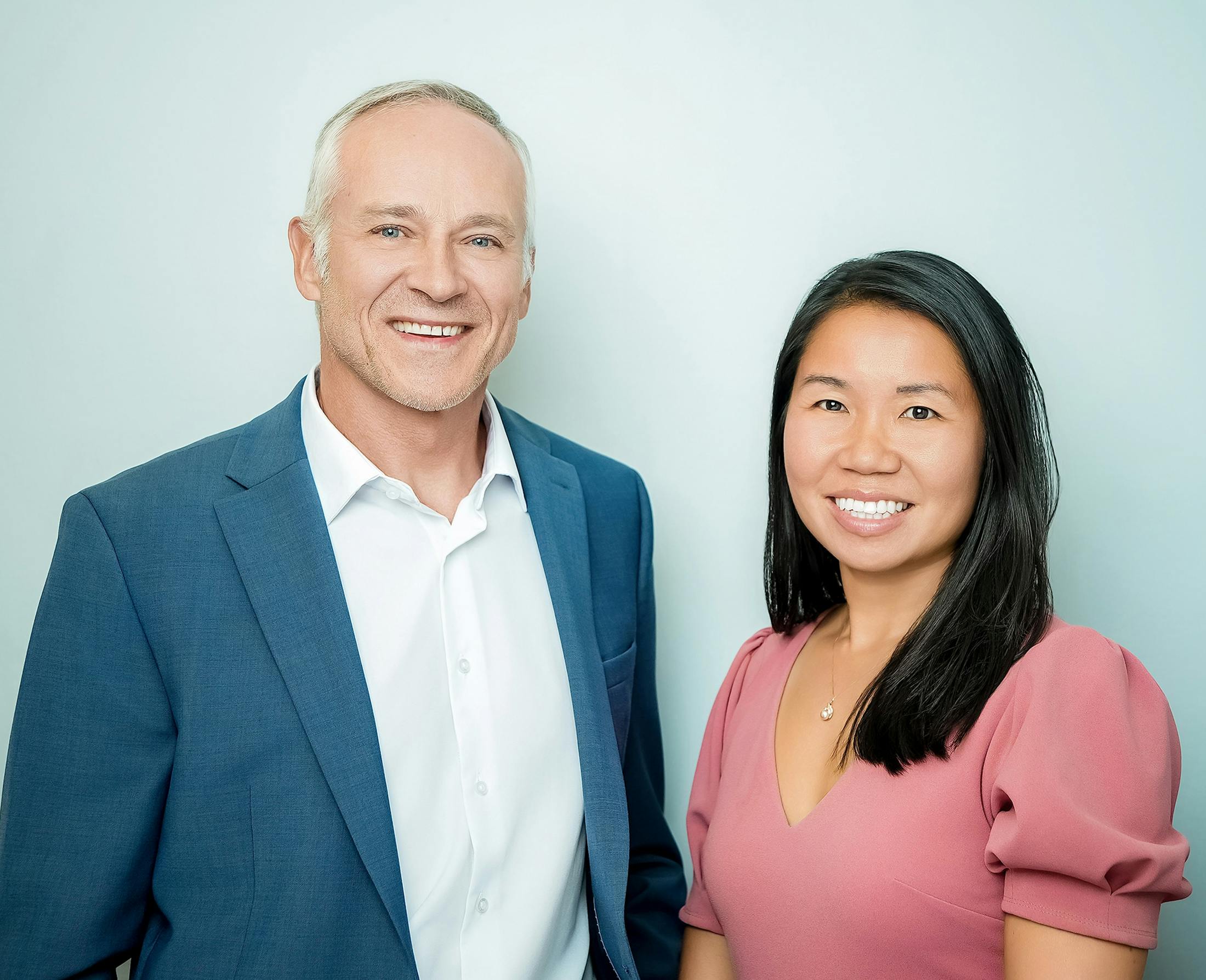 man and woman smiling