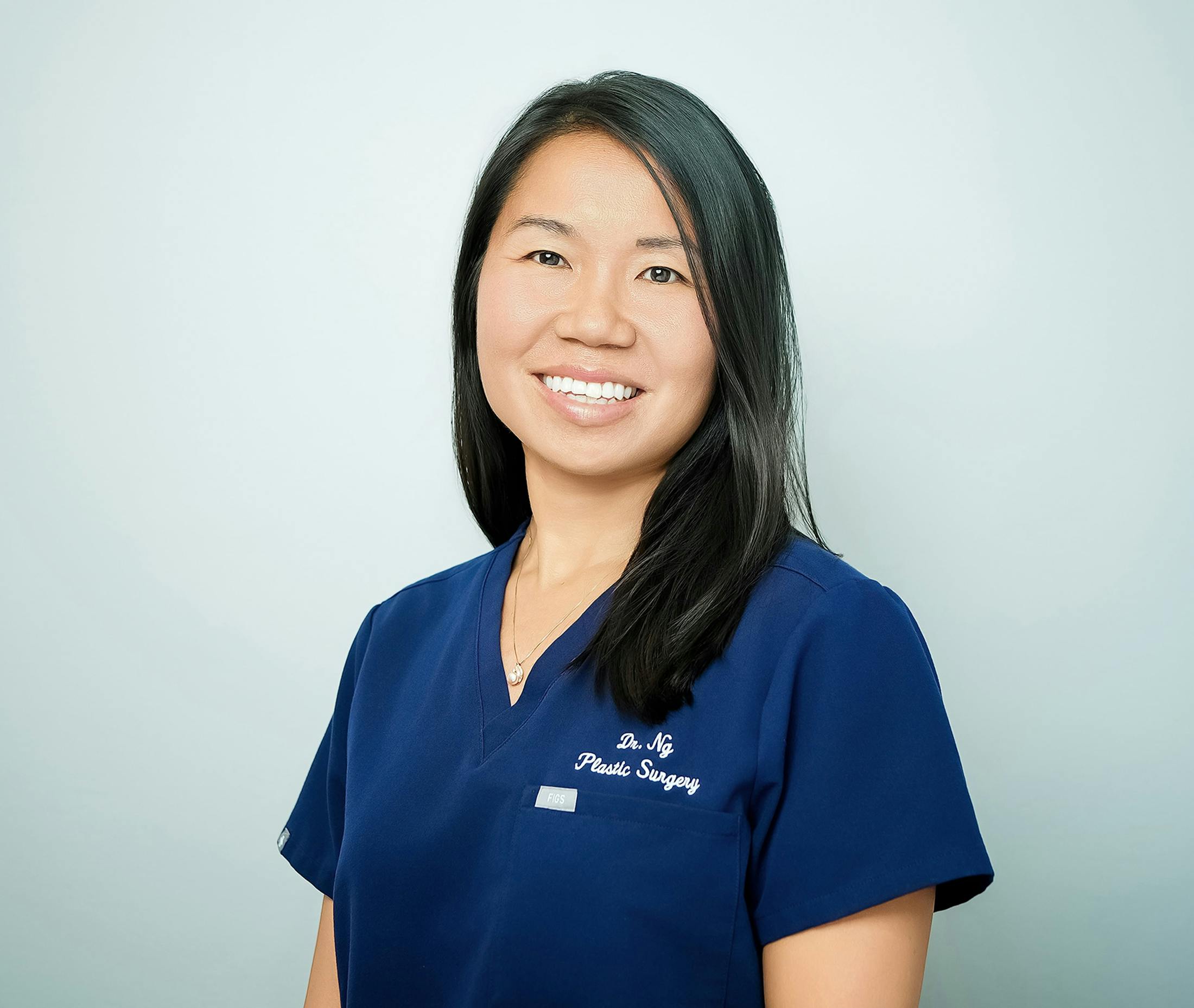 Dr. Glazier in blue scrubs