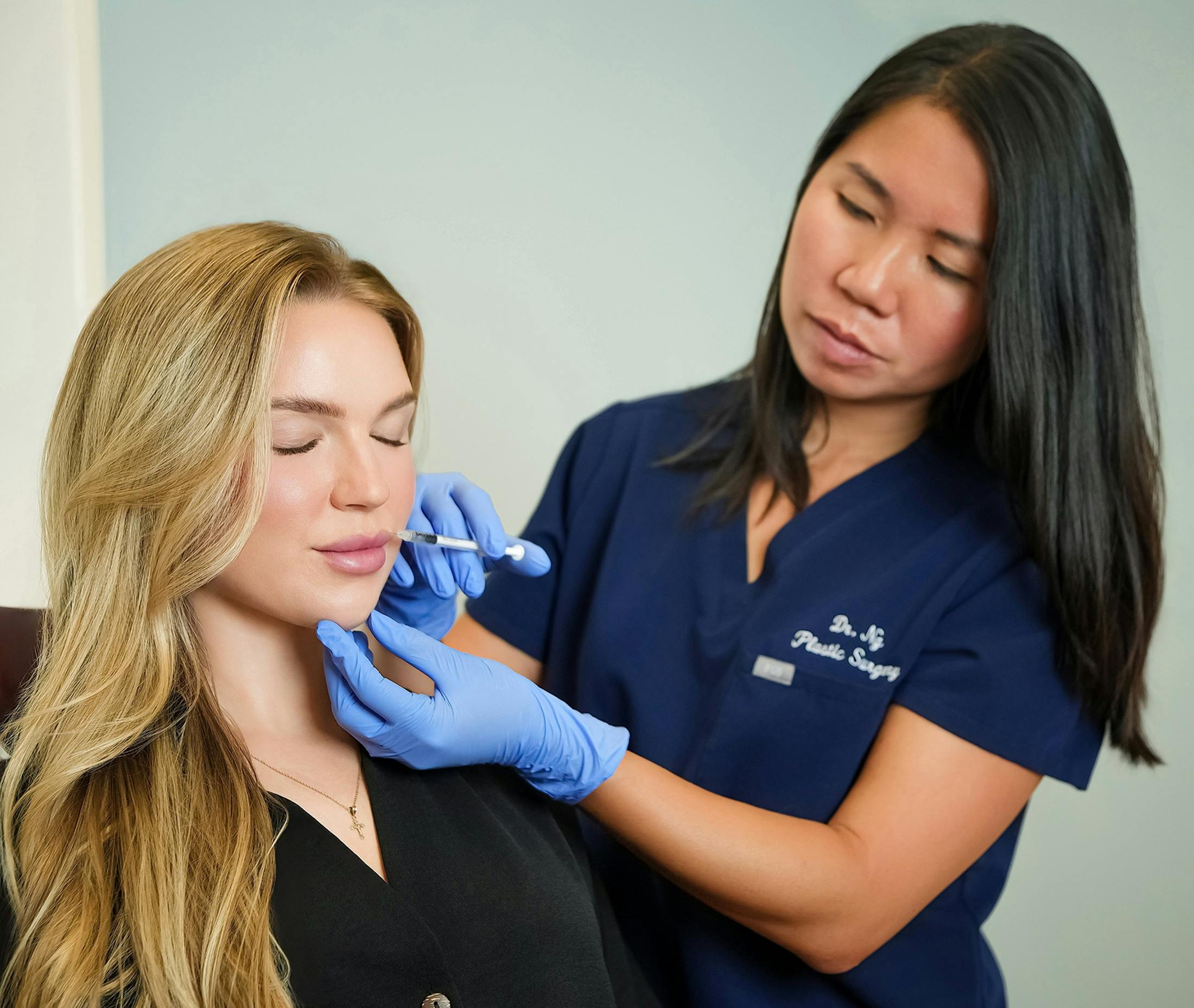 Doctor giving facial injections