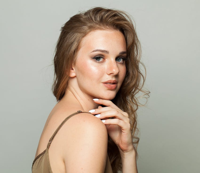 Woman looking over her shoulder