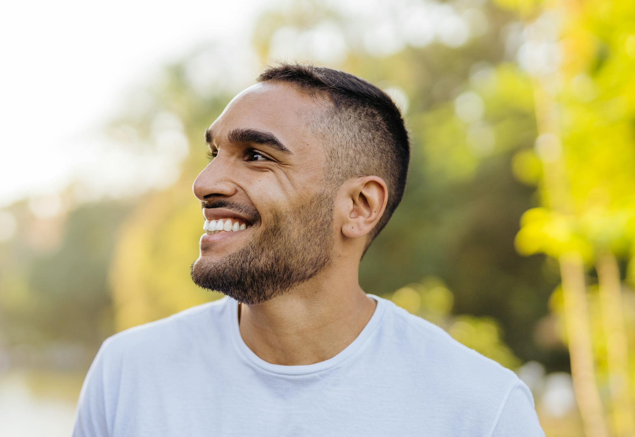man outside smiling