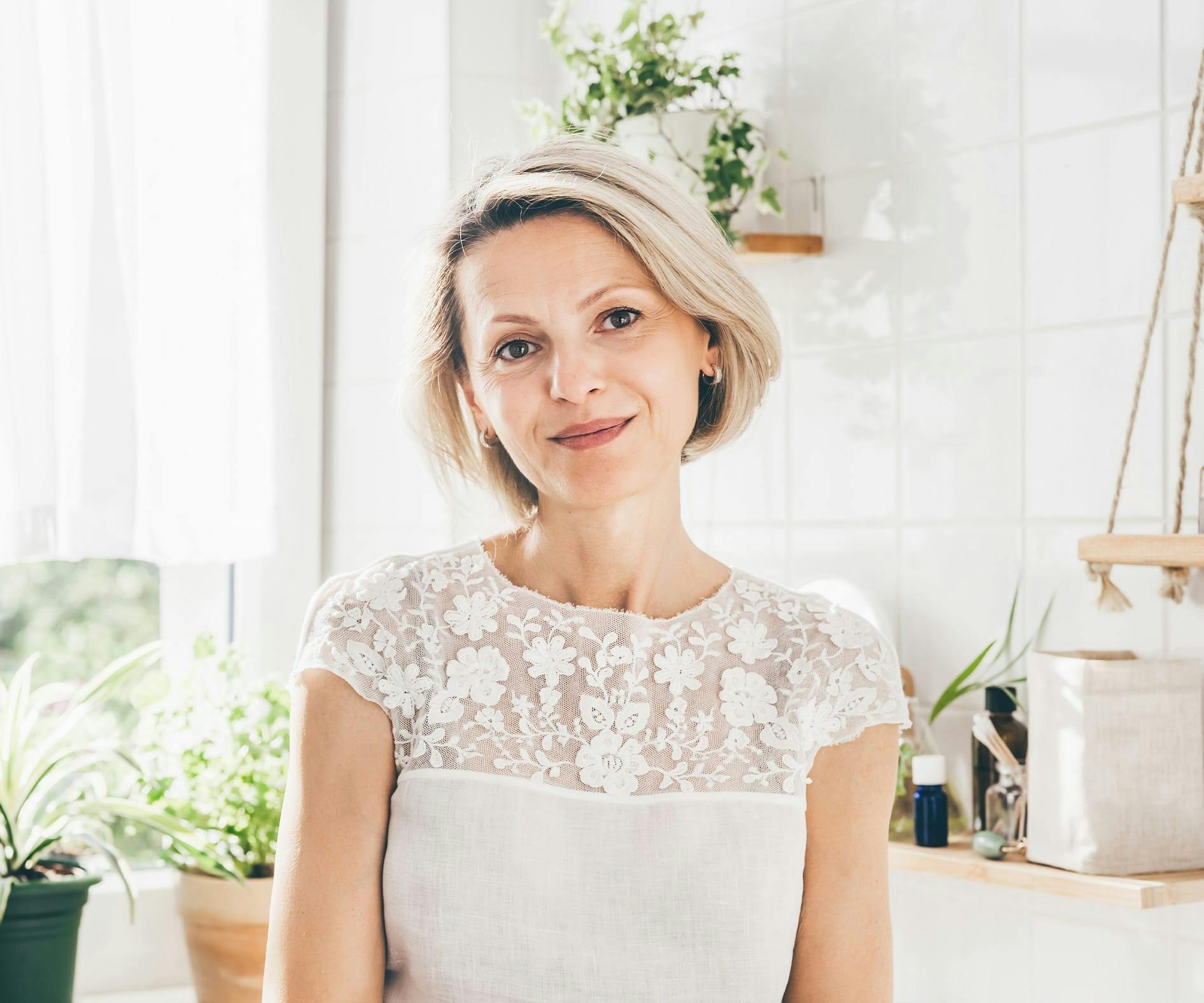 woman in white flowery shirt
