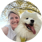 woman with fluffy white dog
