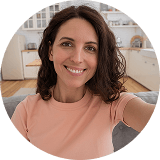 woman smiling indoors