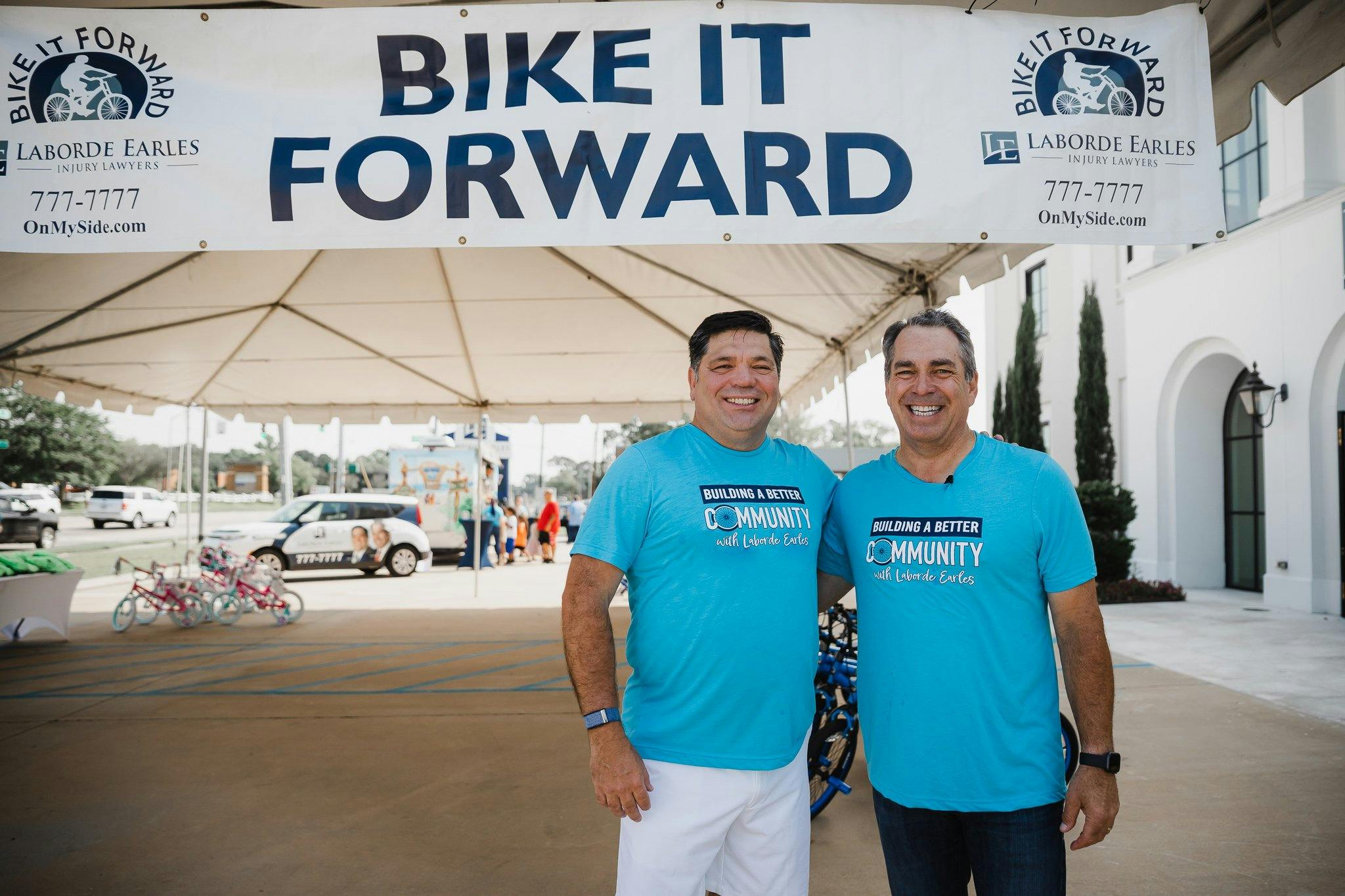 two guys in blue shirts