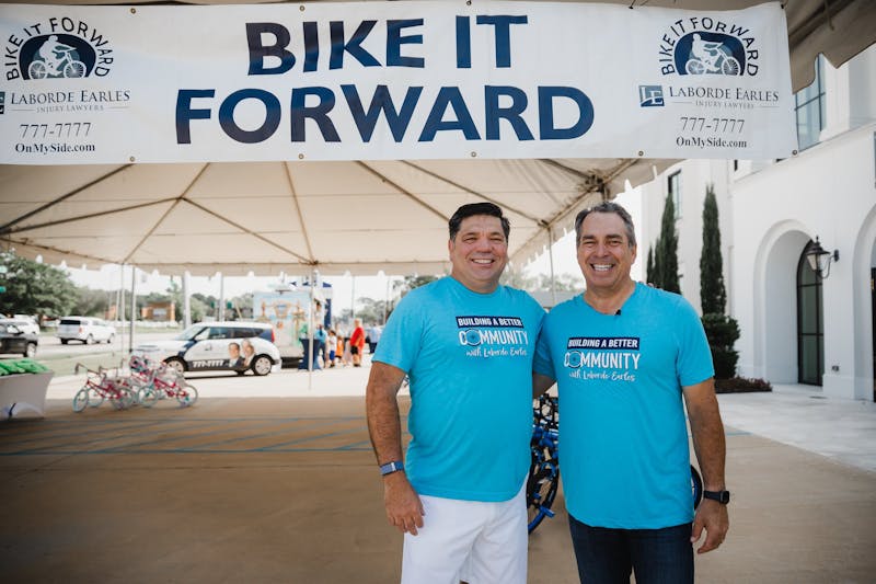 two guys in blue shirts