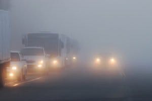 cars driving in fog