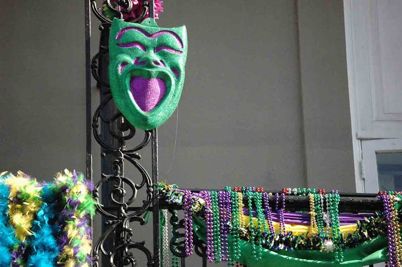 mardi gras mask and beads