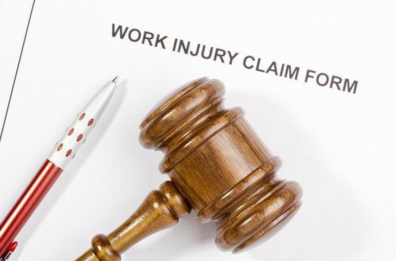 gavel on work injury claim form