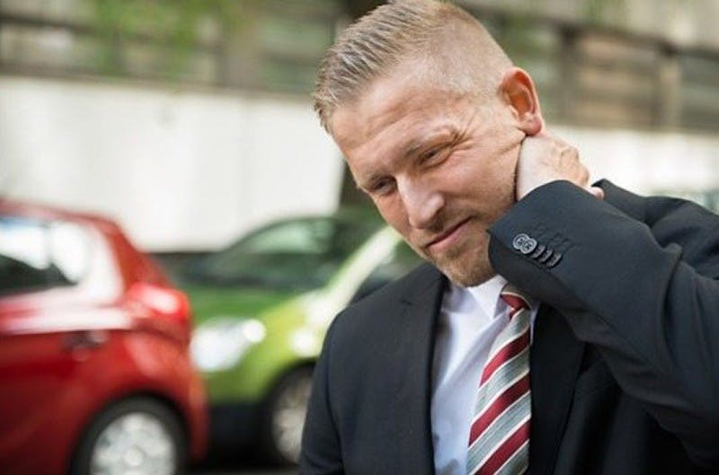 man with sore neck