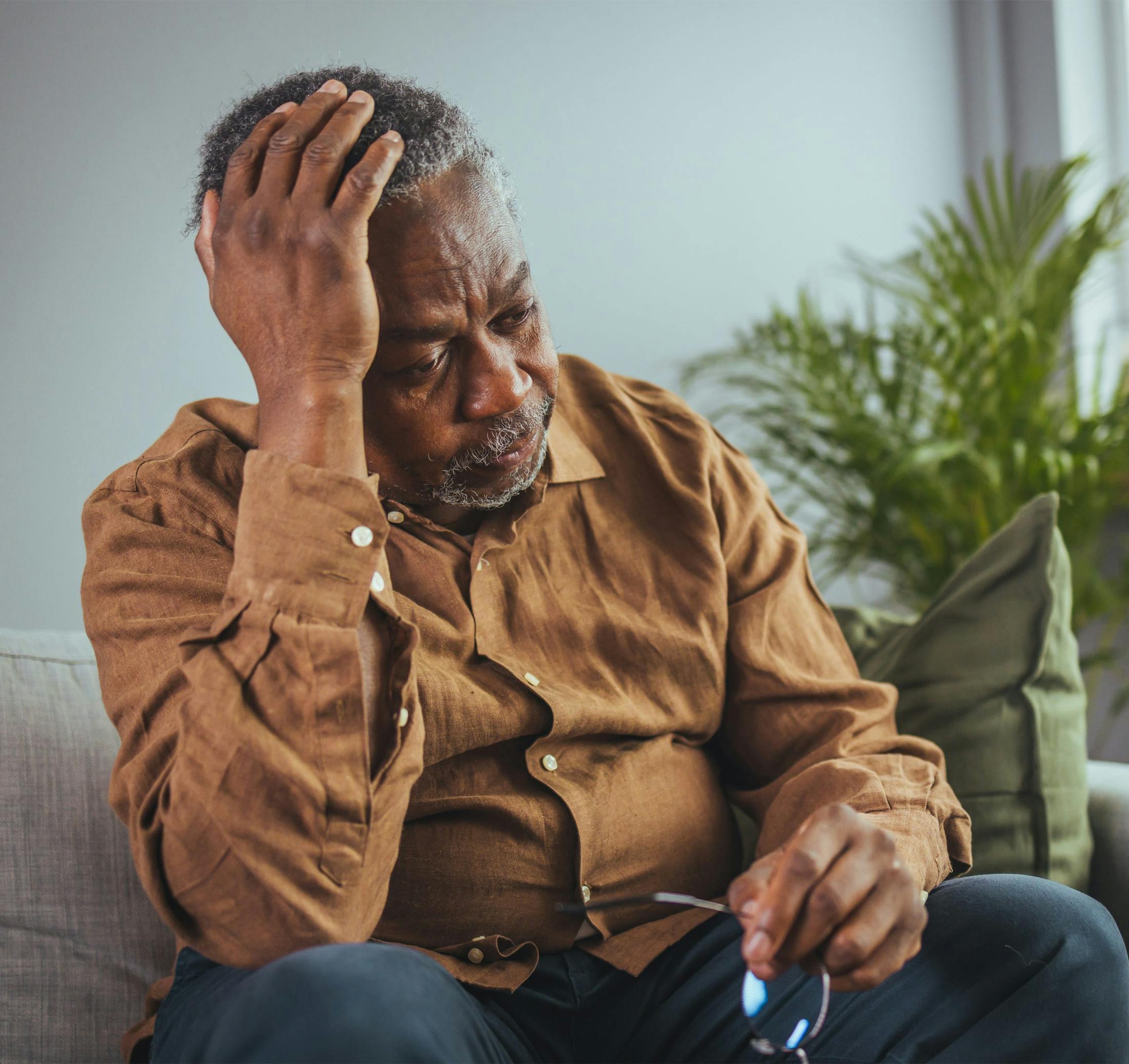 elderly man looking concerened