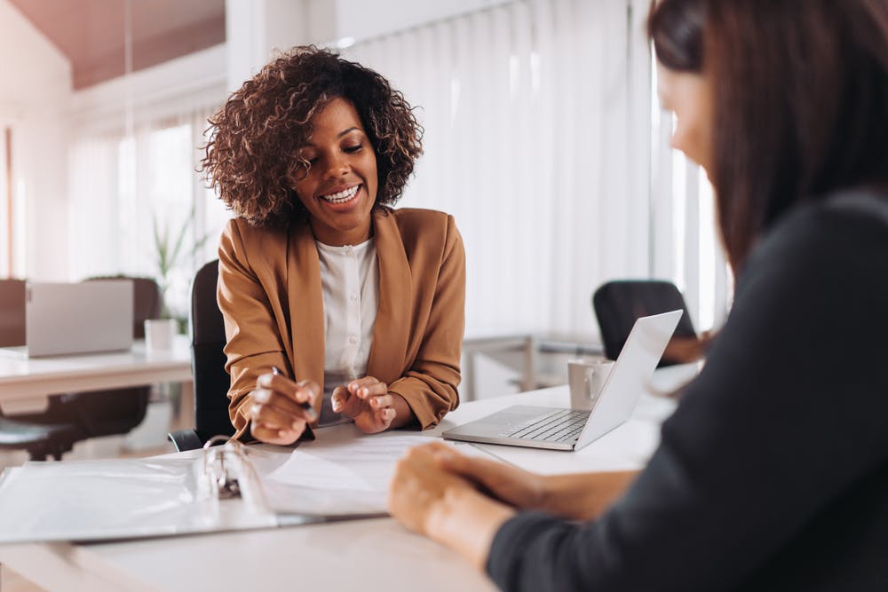 client speaking to a lawyer