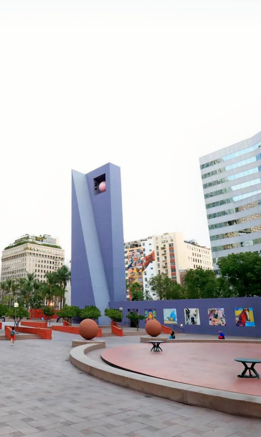 Art in front of some buildings