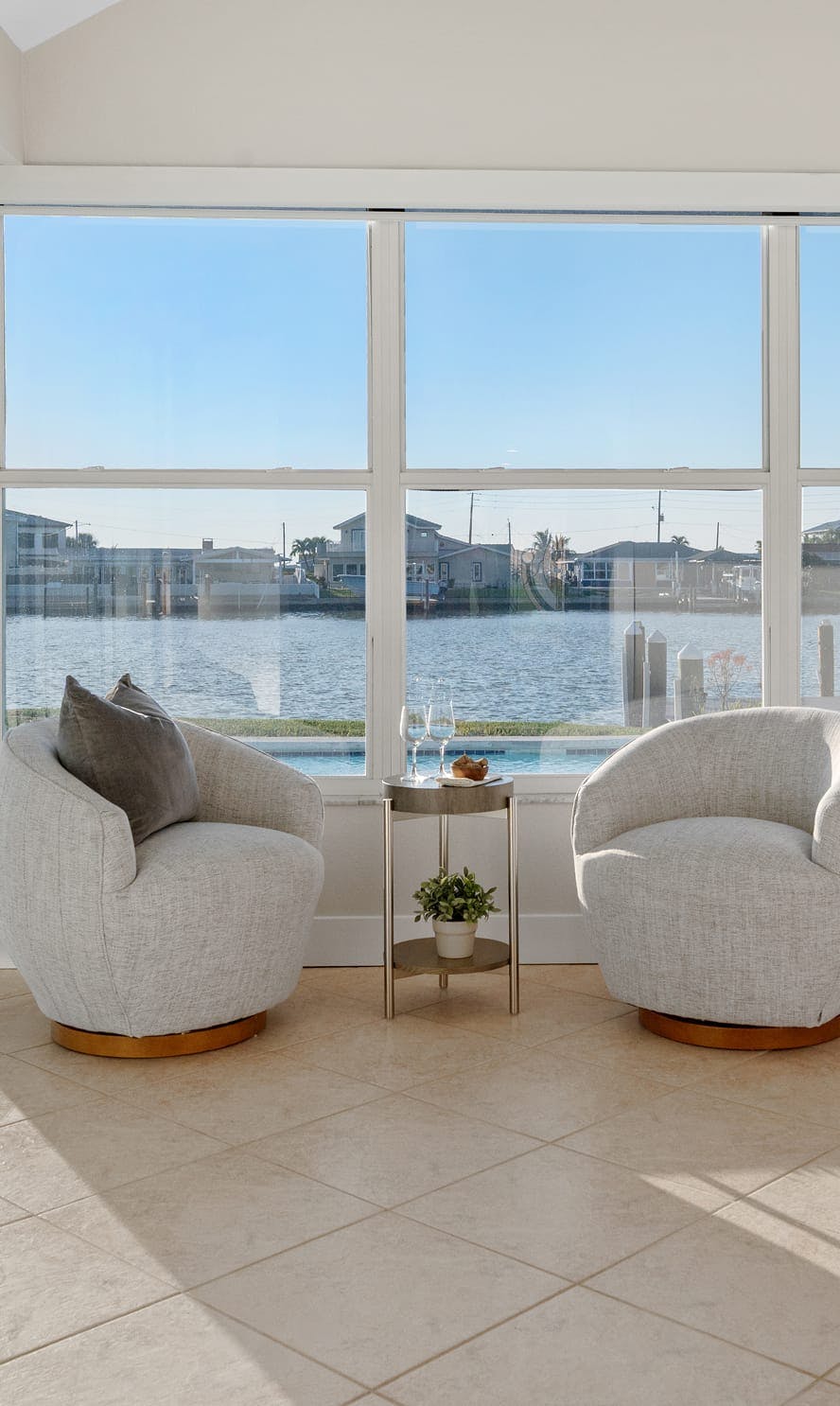 Room with a view out to some water