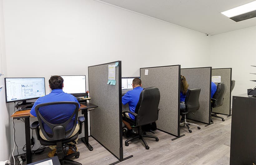 Member of Construction Corps working at his desk