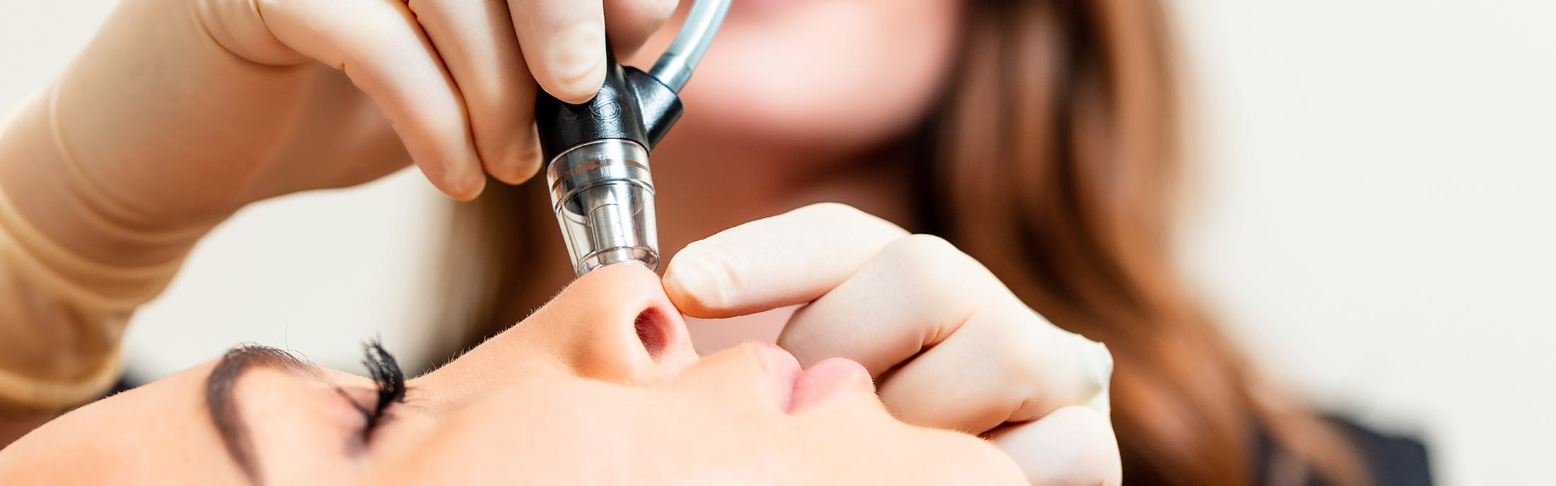 Woman Getting Treatment on Her Nose