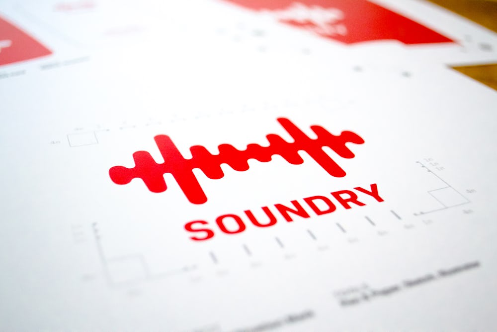 Bold red soundwave logo